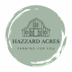 A sage green round circle with a barn outline in the center and wording underneath.