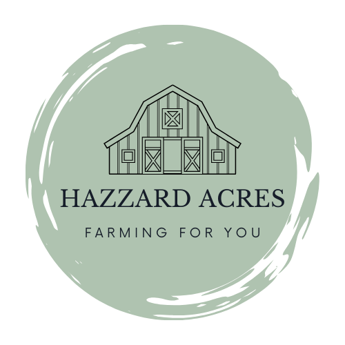 A sage green round circle with a barn outline in the center and wording underneath.